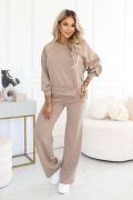 A beige women’s outfit comprising wide-leg trousers and a loose-fitting top – Ayla